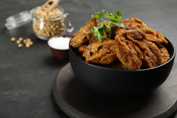 Cooked soy meat on black slate table, closeup