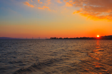 Greece Nafpactos susnet with famous Rio bridje view, Central Greece
