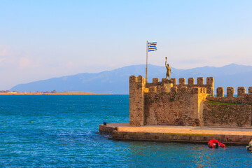 Greece Nafpactos main port with Anemogiannis Statue in ports entrance, Central Greece