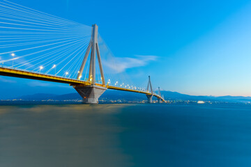 Naklejka premium Greece Rio Bridge, a Suspension bridge crossing Rio and Antirio. It Is the world's second longest cable-stayed bridge. Greece