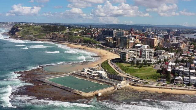 Newcastle city on NSW pacific coast of Australia &ndash; aerial flying to CBD as 4k.
