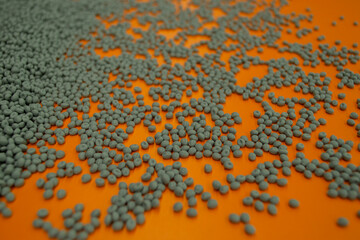 Orange background with grey granules