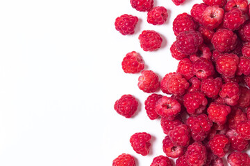 A bunch of ripe raspberries on a white background. Raspberry with copy space for text. Delicious berry