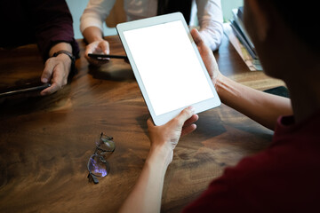 newsletter concept Hand of a young man checking email message box on digital tablet mock-up device....
