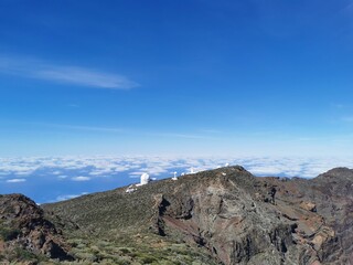 Astro-telescopes over the clouds located at Roque de los Muchachos Observatory on the island of La Palma (Canary Islands)