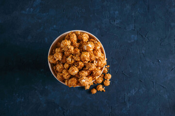 Popcorn caramel on a beautiful textured blue background