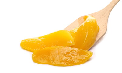 Mango fruit slices with wooden spoon isolated on white background