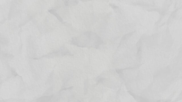 Moving crumpled paper background with stop motion effect. Animation. Abstract texture with a piece of white crumpling paper, seamless loop.
