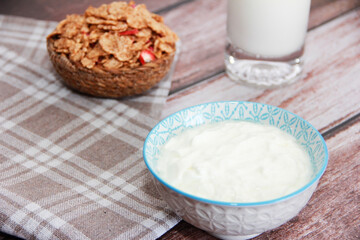 white milk yogurt in a decorative plate