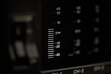 Close up of a volume meter of a video player with several audio channels, a volume meter indicates the intensity of the sound in decibels