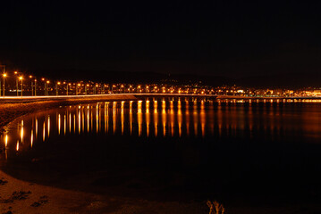 Fototapeta na wymiar Bridge by night with the lights on