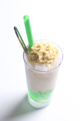 chilled mango and watermelon fruit ice blended drink with green pandan jelly in glass cafe sweet beverage menu