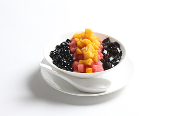 chilled mango and watermelon fruit snow ice with boba bubble pearl andherbal jelly in white bowl cafe sweet dessert menu