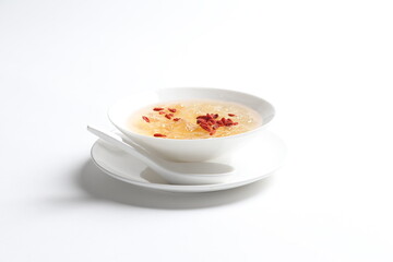 chilled double boiled fresh bird nest with hashima and wolf berries asian sweet soup in white bowl healthy dessert halal vegan food menu for Hong Kong cafe