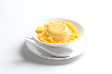 chilled mango sago fruit with pomelo and mango pudding jelly in white bowl sweet dessert menu
