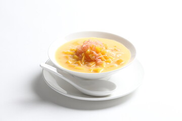 chilled mango sago fruit with pomelo and mango pudding jelly in white bowl sweet dessert menu