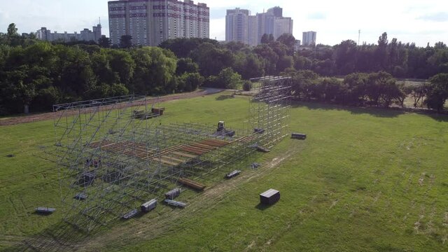 installation of a stage for a concert in the park aerial filming video