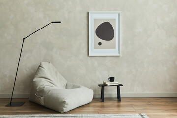 Stylish composition of minimalistic living room interior with mock up poster frame, grey pouf, black tiny coffee table and elegant personal accessories.  Template.