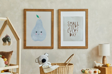 Creative composition of cozy scandinavian child's room interior with two mock up poster frames,...