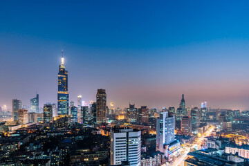 Obraz premium Night view of Zifeng Building and city skyline in Nanjing, Jiangsu, China