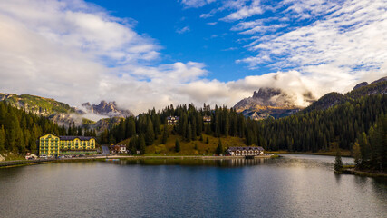 Obraz premium Tre Cime di Lavaredo peaks seen from Misurina lake in Dolomites, Italy in winter, Belluno-Trentino Alto Adige border. Misurina lake, Tre Cime di Lavaredo, Auronzo, Dolomiti, South Tyrol, Italy.
