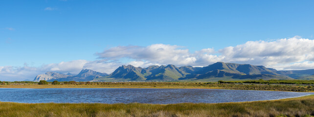 Lake at Rooisand Nature Reserve with the Kogelberg Mountains in the background. Kleinmond, Overberg, Whale Coast, Western Cape. South Africa