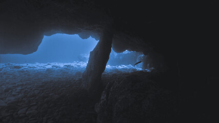Beautiful cave diving with rays of light