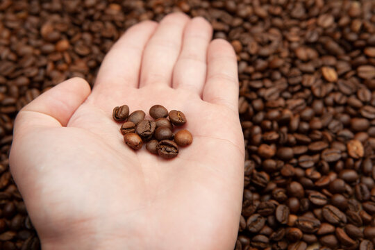 image of hand coffee grain background