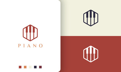 hexagon piano logo or icon in a minimalist and modern style © Murnifine