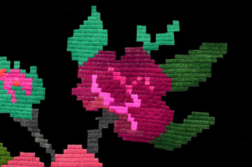 Embroidered red rose on a black background, Ukrainian folk embroidery, beautiful ornament for fabric decor