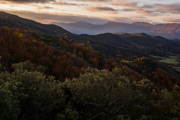 Autumn sunrise in the top of mountain in La Garrotxa, Spain