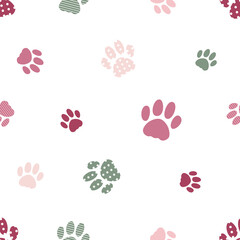 Fototapeta na wymiar Stylized illustration of footprints of cat paws, seamless vector background. Cute pattern with pink and green silhouettes of kitten foot.