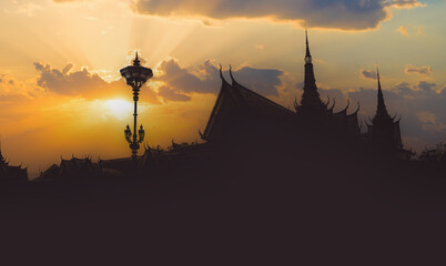 Unique edit concept of the beautiful Royal Palace in Phnom Penh capital illuminated at sunset