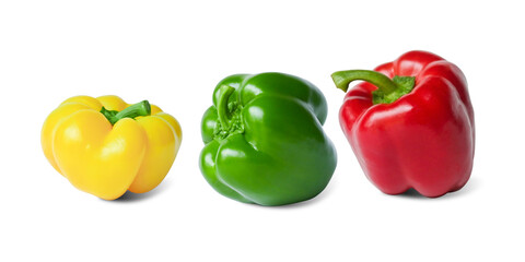 Green, red and yellow peppers isolated on white