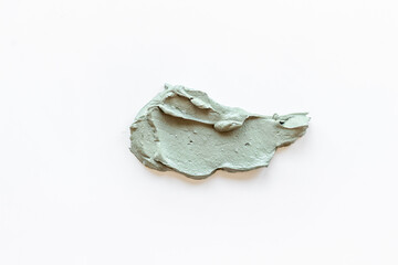 Cosmetic blue clay mask isolated on white background