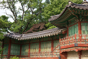 The pavilion has a unique architectural style made in the traditional way inside the old Korean palace (Changdeokgung Palace) harmonized with a quiet atmosphere and green pine trees