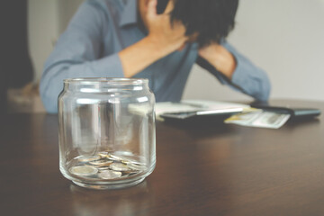 Concept of business loss. Money saving broken. The Bussisnessman is desperate and rustrate depressee due to he can't manage his money.