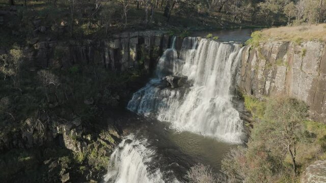 an autumn afternoon view of upper ebor falls at ebor in nsw, australia