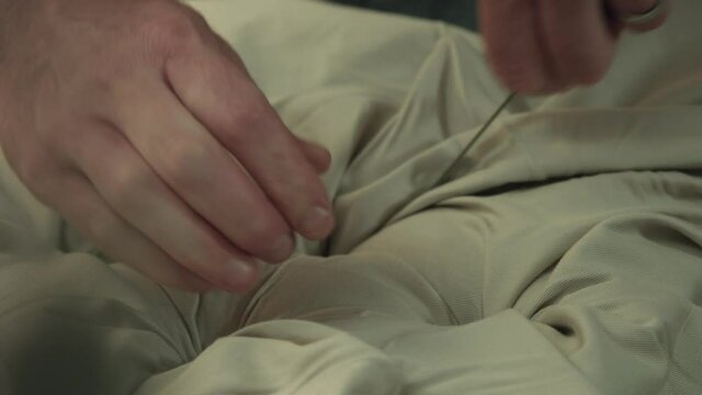 Man working on furniture upholstery, Kenilworth, Coventry, UK