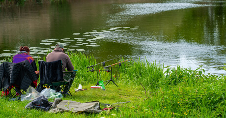 Spot of anglers beside a channel in the Netherlands
