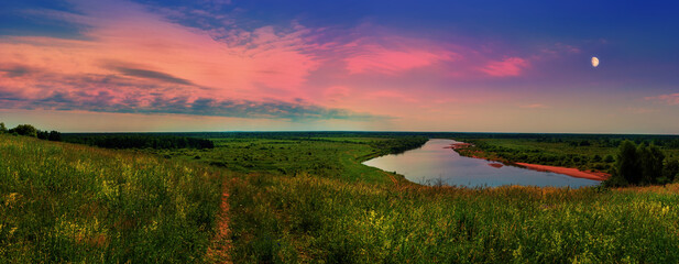 beautiful evening landscape panorama with the river moon distances meadows fields forests sunset sky view from the hill