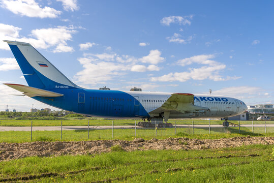 SAINT PETERSBURG, RUSSIA - MAY 29, 2021: The old Soviet aircraft Il-86 (RA-86106) in the parking lot &laquo;Heli Drive&raquo; helicopter center on sunny May day