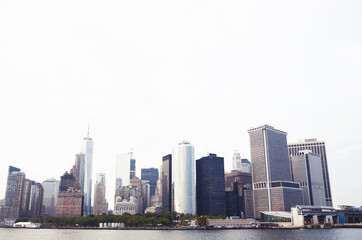 Fototapeta na wymiar USA, NEW YORK: Scenic cityscape of Lower Manhattan skyscrapers from the water 