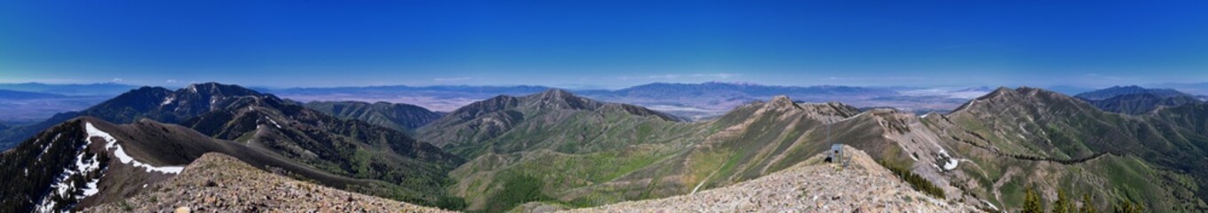 Rocky Mountains Lowe Peak views of Oquirrh range toward Utah Lake, Timpanogos, Wasatch Front by Rio Tinto Bingham Copper Mine, in spring. Utah. United States. USA.