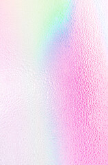 A holographic gradient background of rainbow color. Vertical rainbow color background. High quality photo