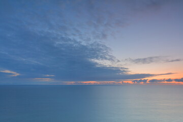 Fototapeta premium The North sea at dawn, taken from Bempton cliffs, East Yorkshire, UK, with some motion blur of the sea.