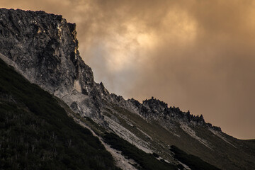 Expressive sky with sun and cloud in a mountain in Lanín National Park, Neuquén, Argentina
