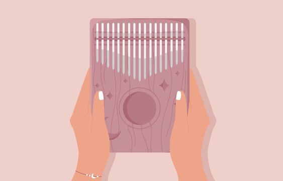 Hands hold kalimba. Mbira or thumb piano. African traditional musical instrument. Folk wooden mbira with carvings of the Moon and stars. Flat cartoon vector illustration. Isolated on pink background. 