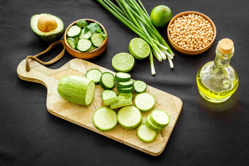 Fototapeta na wymiar Green vegetables and chickpea in bowl for healthy vegan dinner