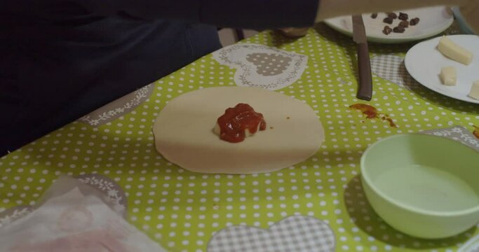 Homemade panzerotti or called also calzone during the ingredient 
